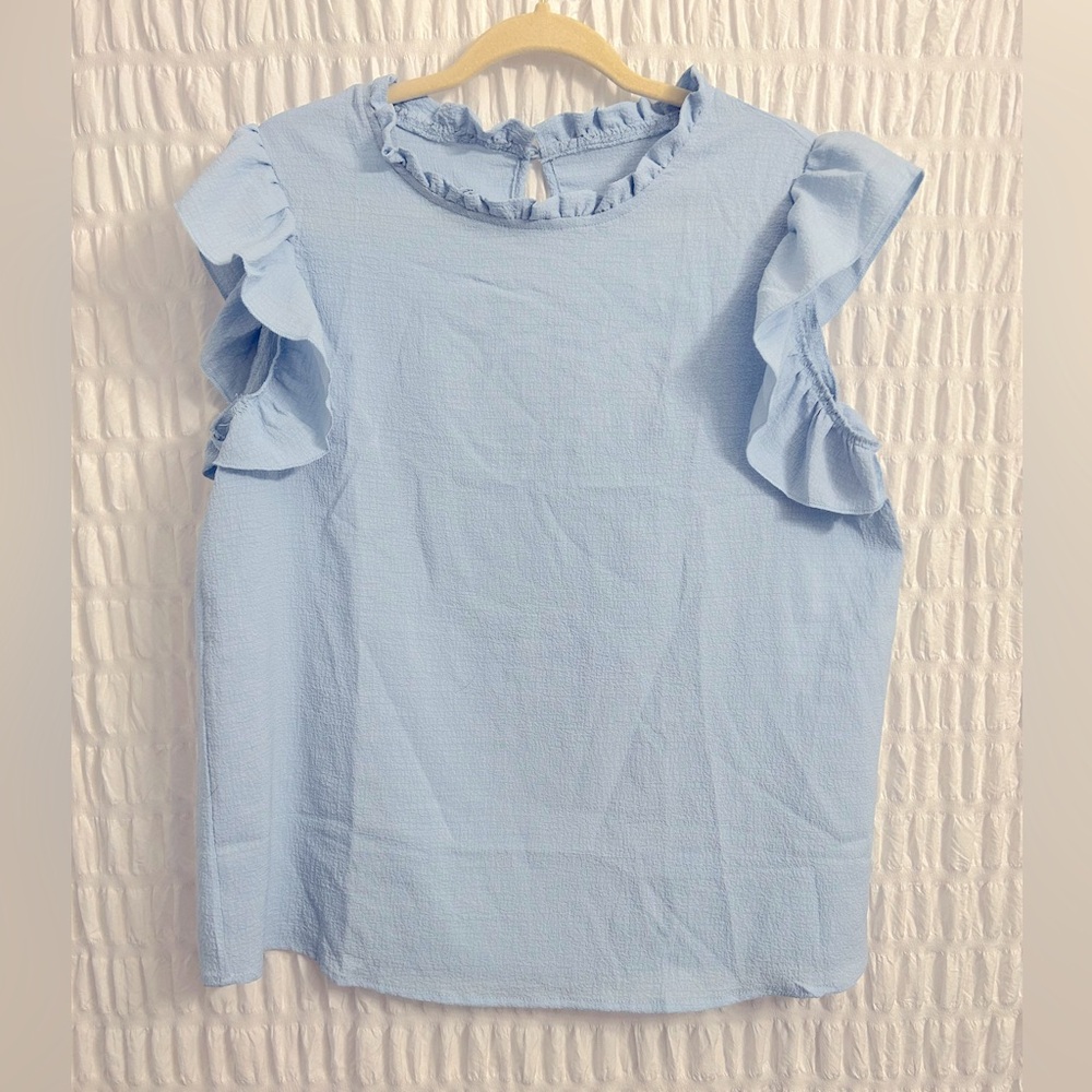 “XL” LIGHT BLUE BLOUSE. Fits better for a large.